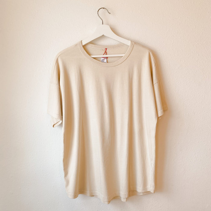 Her Tee